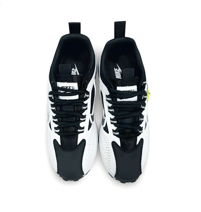 Découvrez les baskets Nike Bailleli en White / Black, alliant style rétro-moderne et confort ultime. Soyez prêt pour vos journées actives !